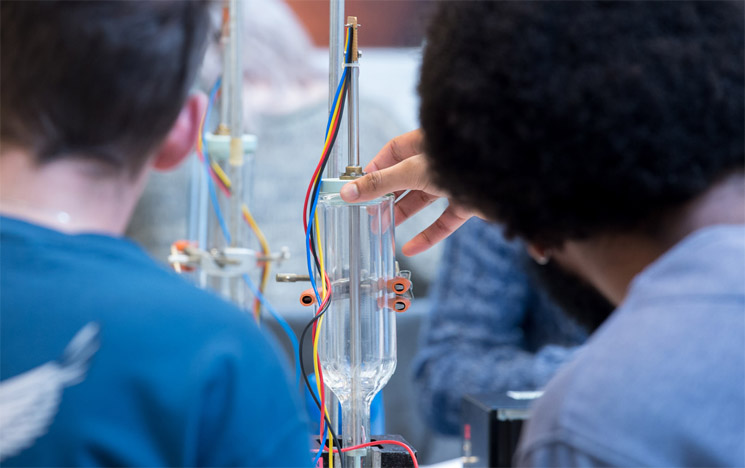 Students setting up an experiment at the University of Sussex