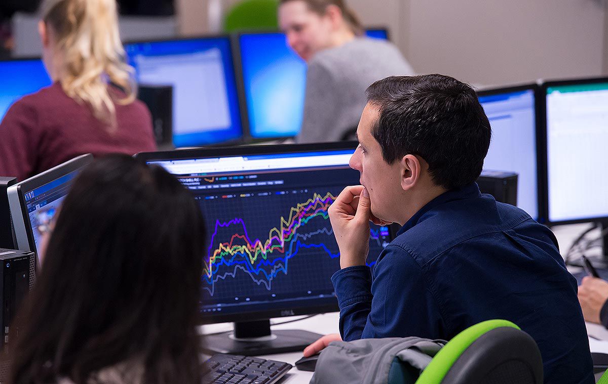 A student analyses data at a computer