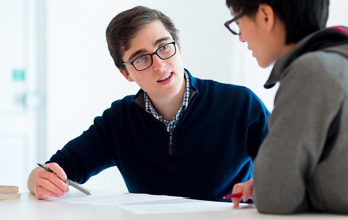 Two students deep in conversation