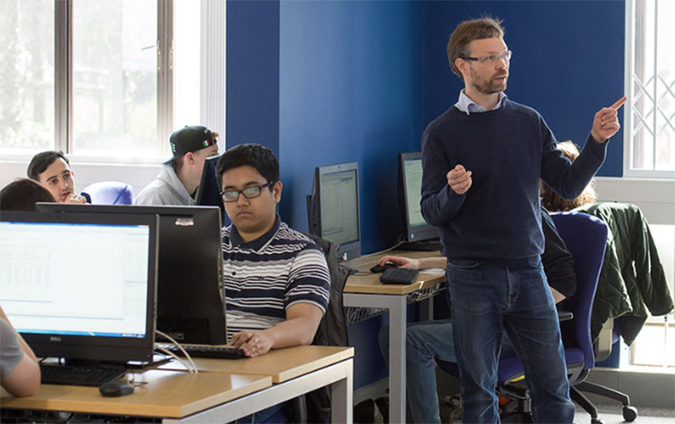 Lecturer teaching Economic students at the University of Sussex