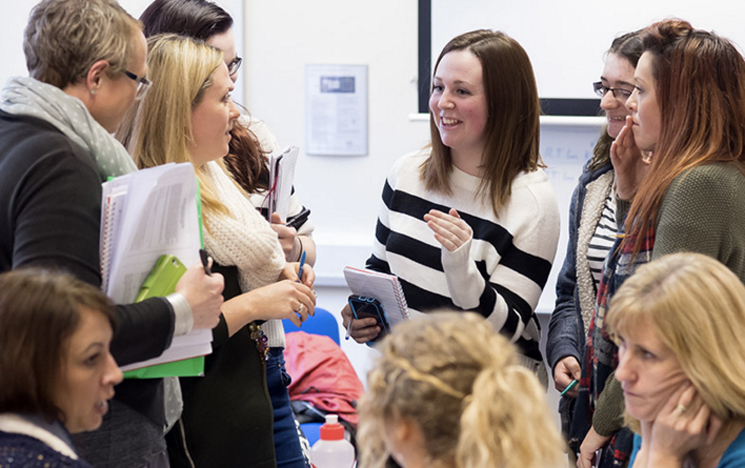 Student in a seminar at the University of Sussex