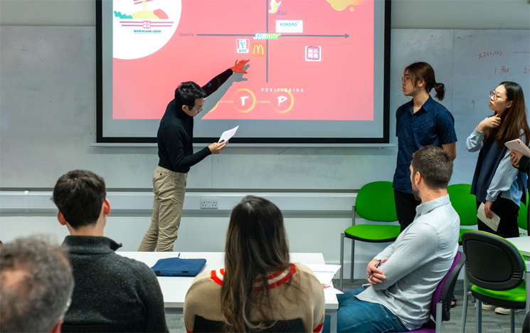 Students in a seminar at the University of Sussex