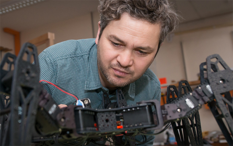 Researcher carrying out work in a lab at the University of Sussex