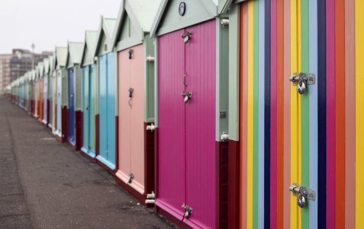 Brightly coloured beach huts