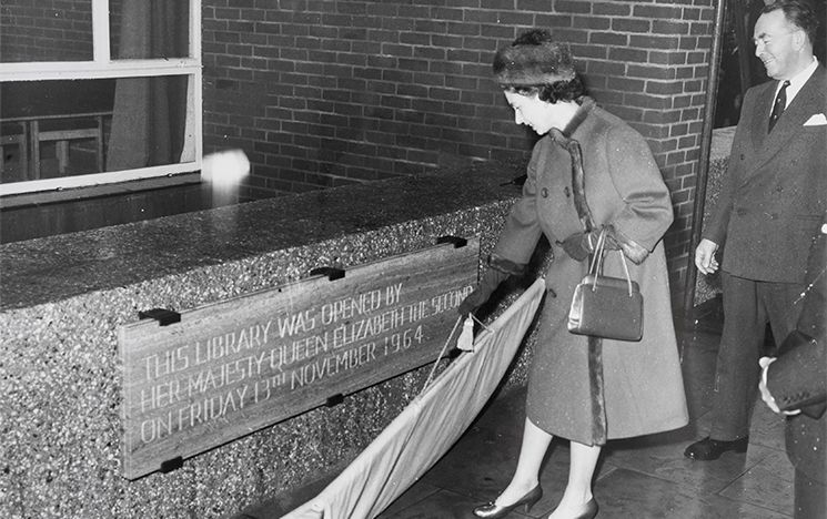 Black and white photo of the Queen opening the University of Sussex Library.