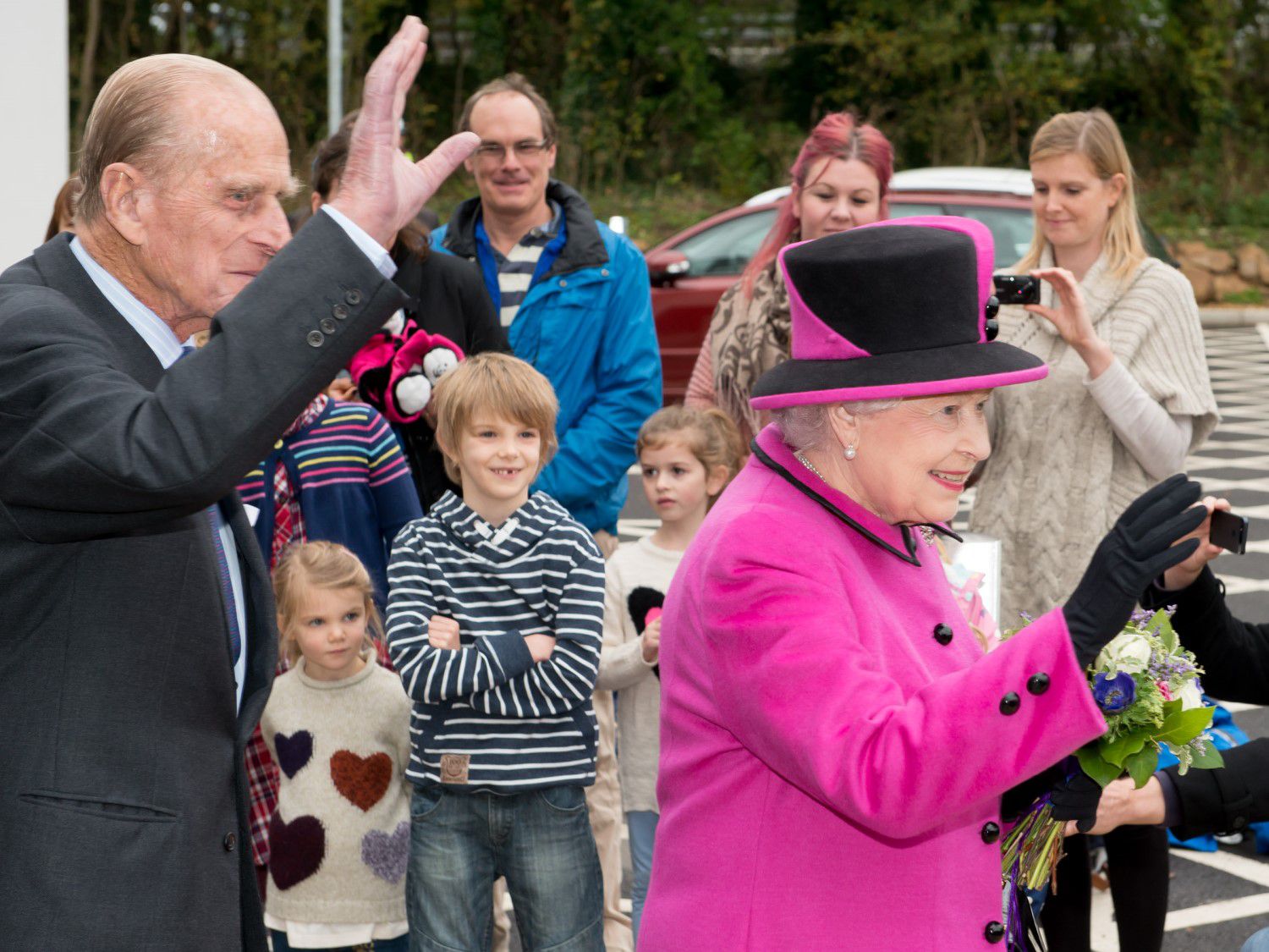 Prince Philip, Duke of Edinburgh, and Her Majesty the Queen arriving at The Keep on 31 October 2013 to officially open the building