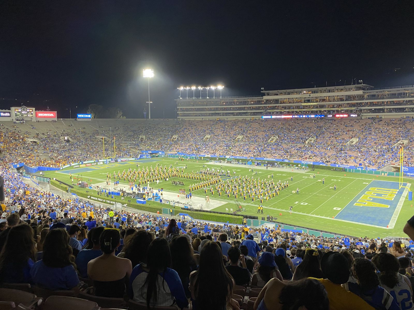 Wide shot of a full American football stadium