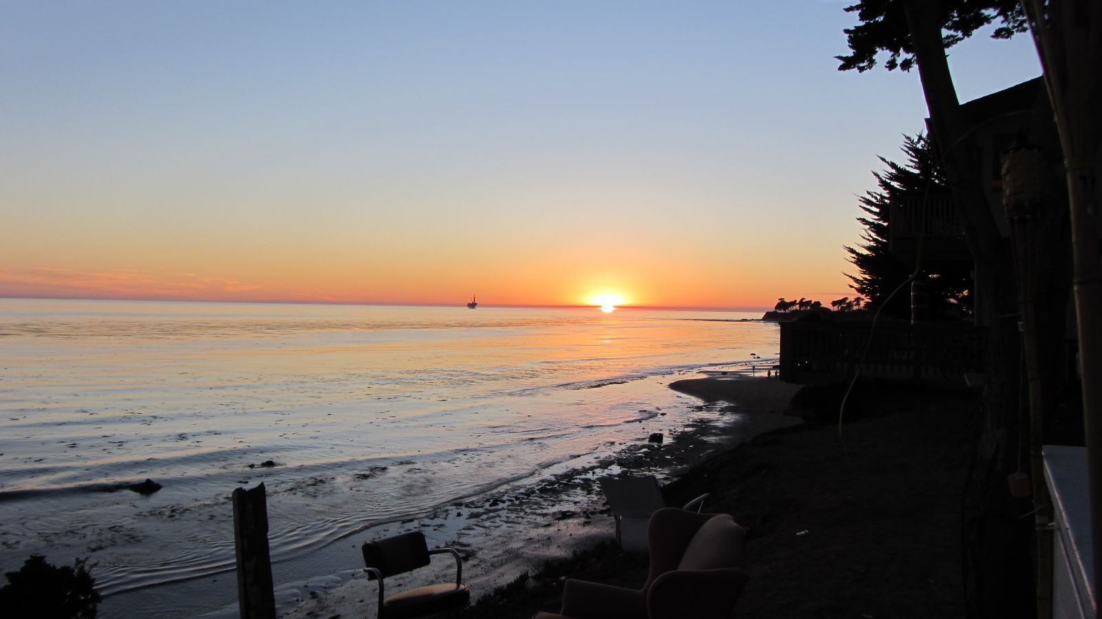 Coastal sunset on a sandy beach