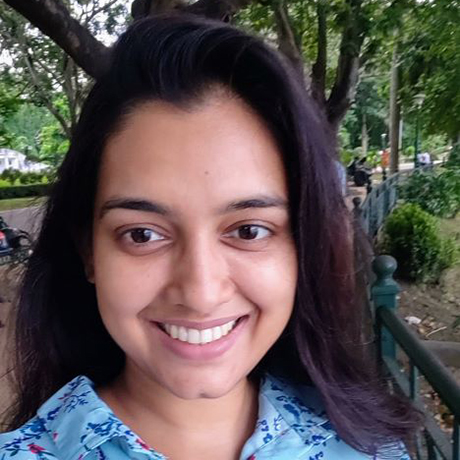 Image of Dipti Kashyup headshot in front of tree and lawn