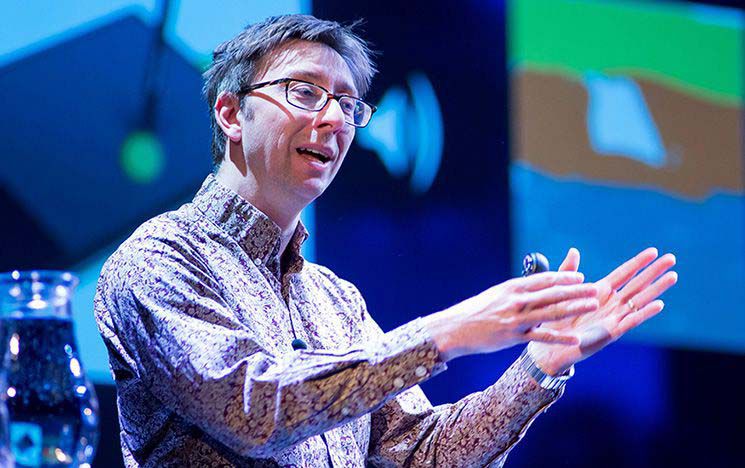 A Sussex staff member gives a talk to an audience