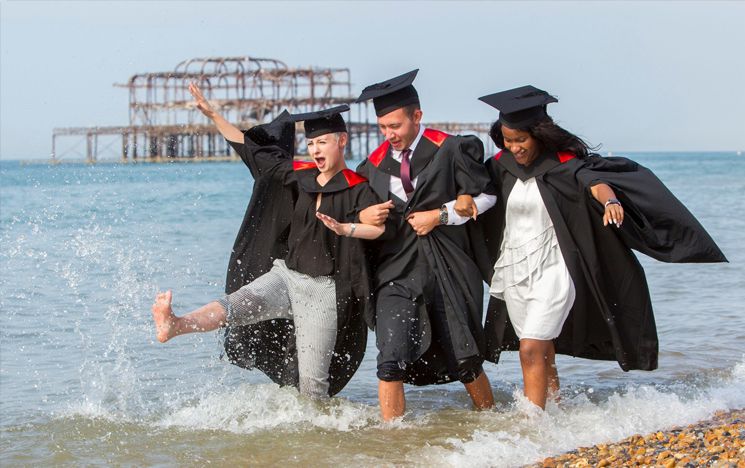 Celebrating graduating on Brighton beach