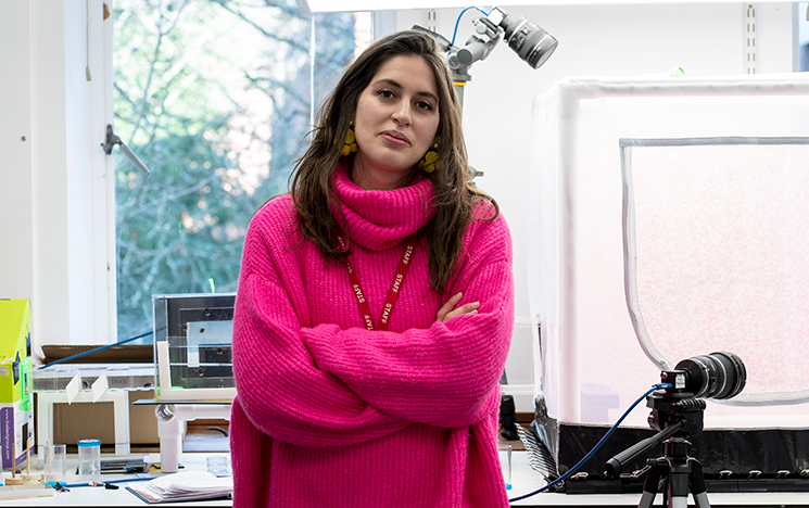 

Image of Natacha Rossi in front of windows