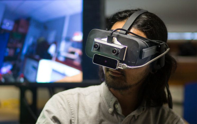 A person wearing a Virtual Reality headset