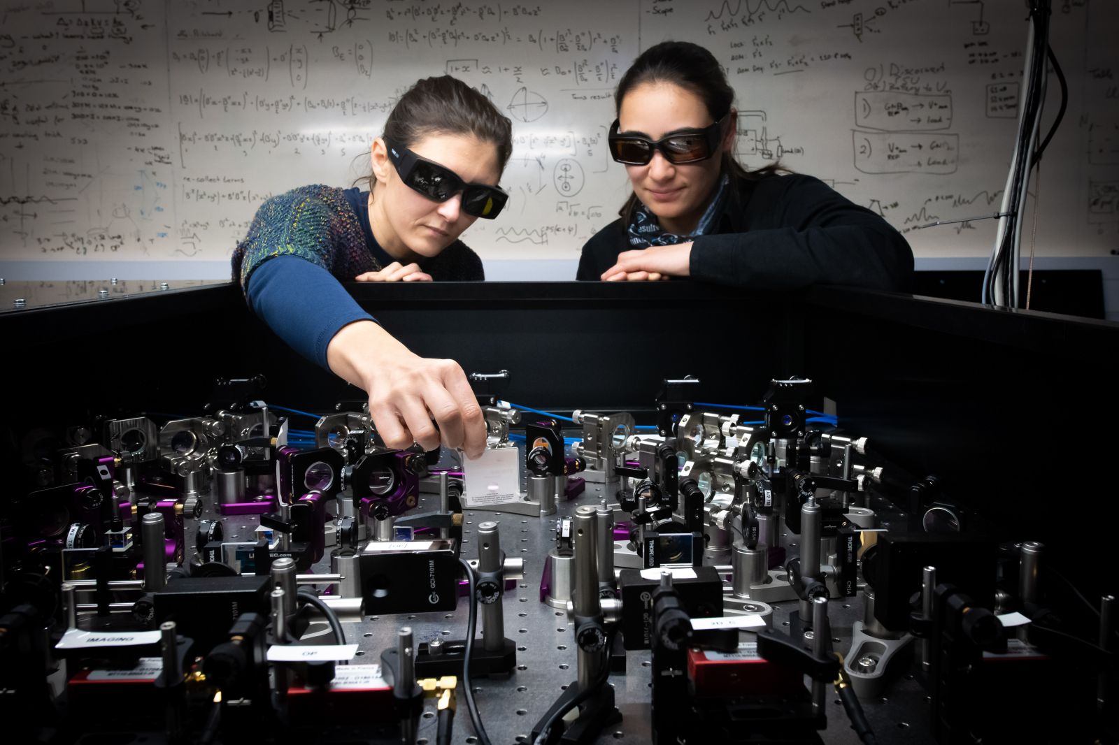 Two people working together on some hardware