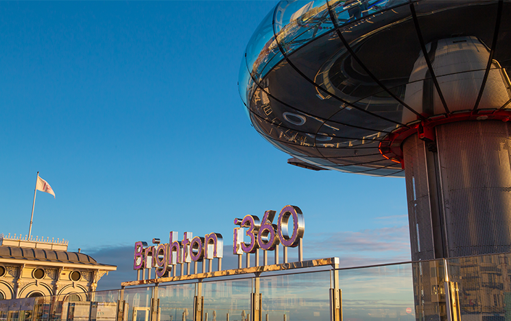 the i360 viewing platform on brighton seafront on a sunny day