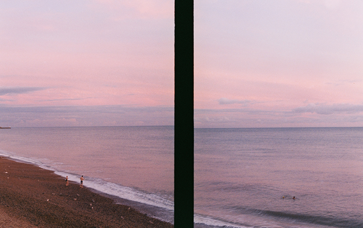 Brighton seafront at sunset with the i360 centre of shot