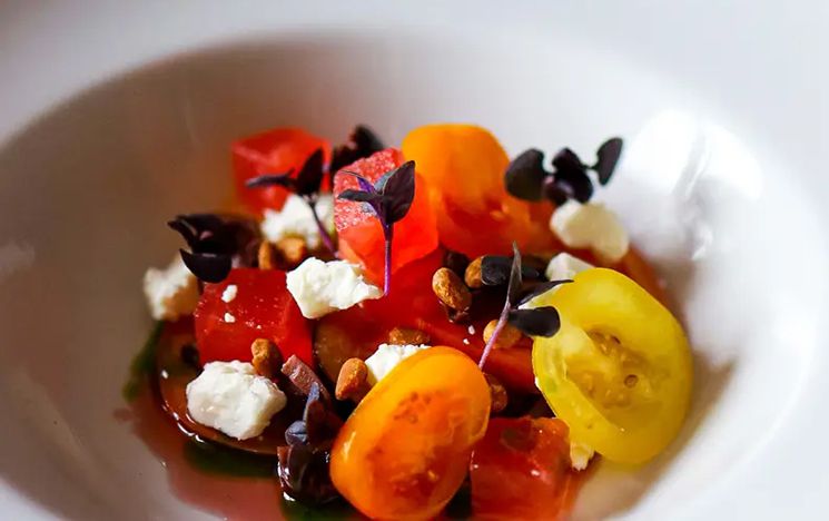 Salad with tomatoes in a bowl