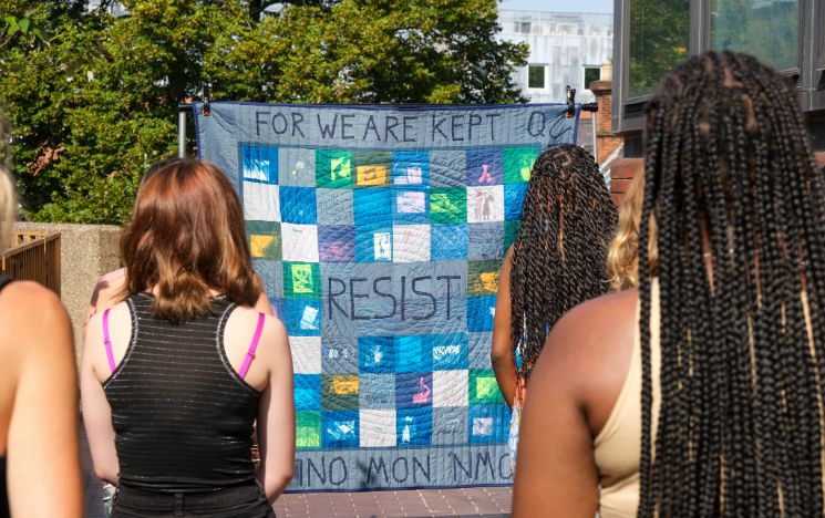 Students smiling and enjoying a lecture