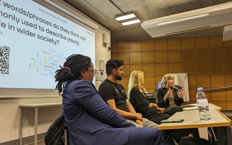 Panelists speak at a Centre for Innovation and Research in Childhood and Youth