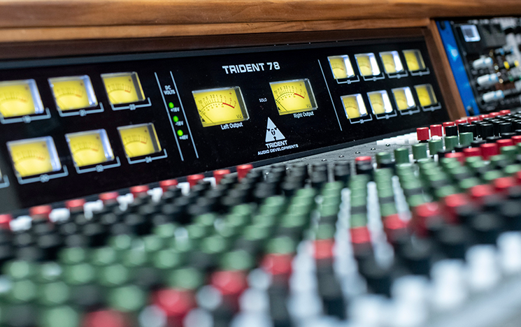 A close up of a sound board