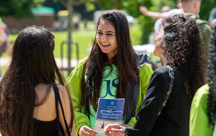 Smiling student ambassador at Open Day