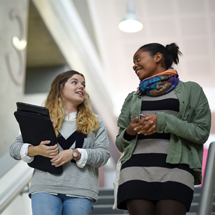 Students talking on the stairs