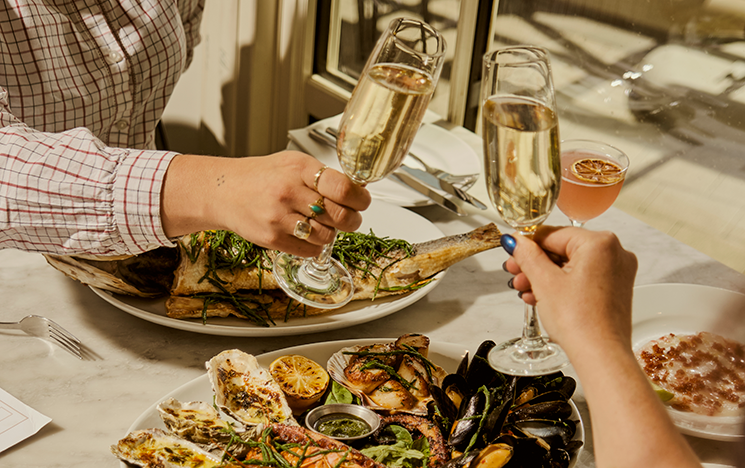 Champagne and a platter at Riddle & Finns
