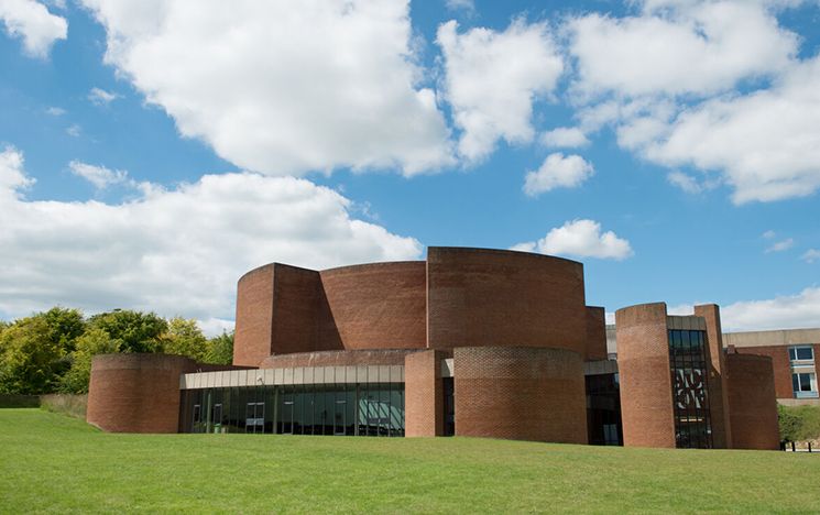 Exterior shot of the Attenborough Centre in the sunshine