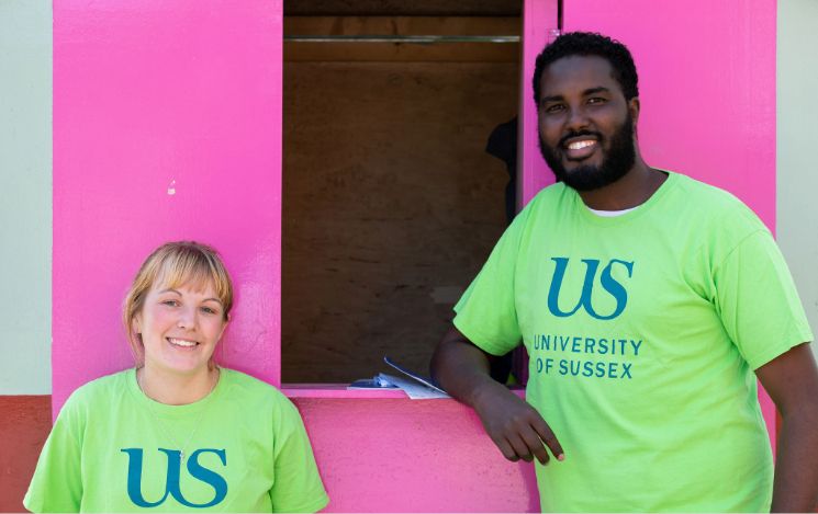 Student helpers at an information booth at an Open Day