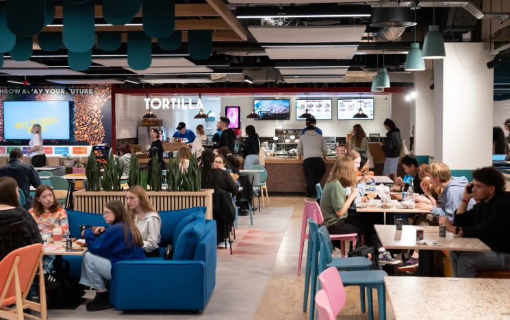 Students eat lunch at Eat Central