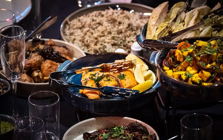 An example of the spread of food served at awards ceremonies, including fish, rice and potatoes