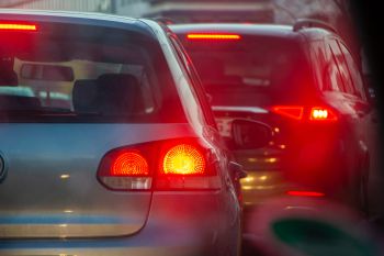 Two cars are lined up in a traffic jam