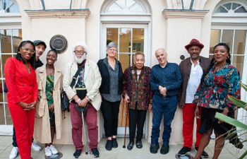 Attendees stand together at the Black at Sussex event at the Black Cultural Archives in Brixton