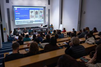 View across audience from back towards panel