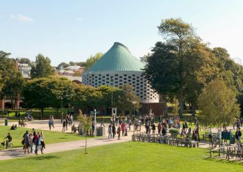 Campus image of the meeting house and library square