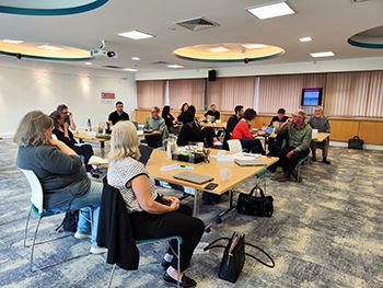 Sussex staff sat in groups during the workshop where the apprenticeship programme was mapped