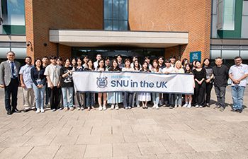 A group photo of all students and faculty from the Seoul National University summer school outside the front of Jubilee building