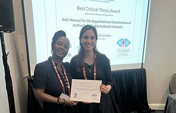 Belinda Zakrzewska with Dr Penelope Muzanenhamo with her Best Critical Thesis Award certificate