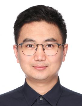 A portrait headshot of SPRU lecturer, Dr Xiangming Tao