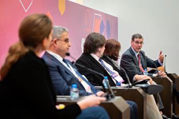 Panellists sat on stage debating