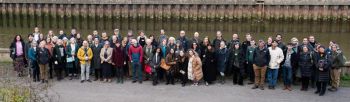 Group picture of the 'Love your Ouse' campaign group: people gathered on the banks of the river Ouse