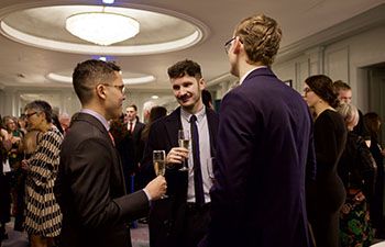 Business School graduates celebrating at the event