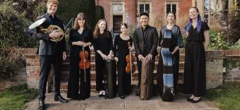 A group of young musicians with instruments