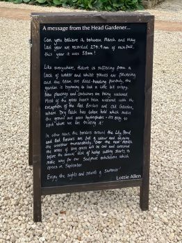 Chalkboard at entrance to garden with message from Head Gardener at Hidcote Manor