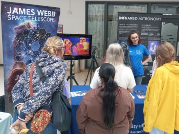 University of Sussex exhibitor stand at Hastings Science Fair, showing interactive STEM activities and displays
