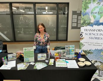 University of Sussex exhibitor stand at Hastings Science Fair, showing interactive STEM activities and displays