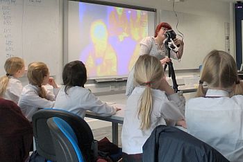 Primary school students learning about heat using a thermal camera