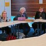 Professor Miriam David with colleagues at a roundtable discussion
